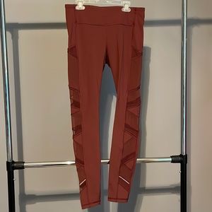 LULULEMON Size 8 Maroon/Burgundy leggings with mesh side detail